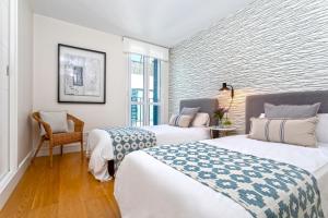 Posteľ alebo postele v izbe v ubytovaní Genteel Home San Agustín