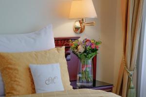 Posteľ alebo postele v izbe v ubytovaní Hotel Mignon