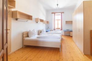 Letto o letti in una camera di Gasthof Elisabeth