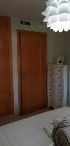 Postel nebo postele na pokoji v ubytování RESIDENCIAL LAS PALMERAS