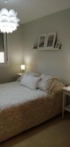 Postel nebo postele na pokoji v ubytování RESIDENCIAL LAS PALMERAS