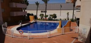 Bazén v ubytování RESIDENCIAL LAS PALMERAS nebo v jeho okolí