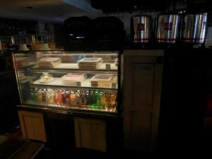 a refrigerator filled with lots of food and drinks at French Hotel in Ipoh