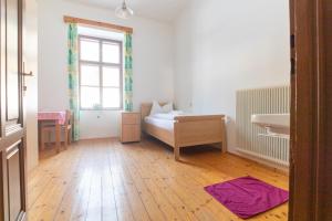 Letto o letti in una camera di Gasthof Elisabeth
