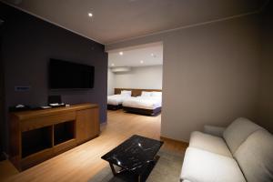 TV a/nebo společenská místnost v ubytování Hotel The Star