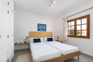 Postel nebo postele na pokoji v ubytování Villa Sol 9