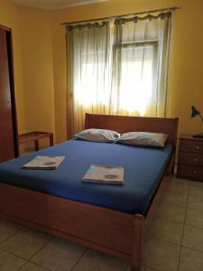 Postel nebo postele na pokoji v ubytování Europa Apartments Stefanos