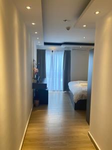 Giường trong phòng chung tại Hôtel Select - Réunion