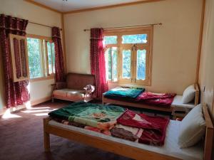 Ένα ή περισσότερα κρεβάτια σε δωμάτιο στο Kalash Continental Hotel & Resort