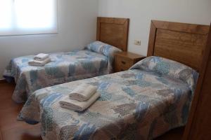 Llit o llits en una habitació de Casa Rural La Sureña 2