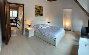 Letto o letti in una camera di Residence Vue Chateau