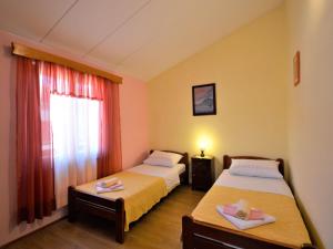 Postel nebo postele na pokoji v ubytování Holiday Home Milka 1 by Interhome