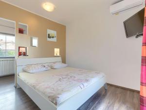 Posteľ alebo postele v izbe v ubytovaní Holiday Home Duje & Mare by Interhome