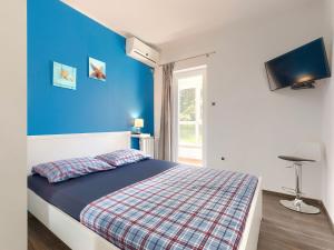 Posteľ alebo postele v izbe v ubytovaní Holiday Home Duje & Mare by Interhome