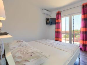 Posteľ alebo postele v izbe v ubytovaní Holiday Home Duje & Mare by Interhome