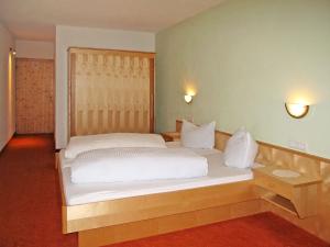 Postelja oz. postelje v sobi nastanitve Apartment Haupthaus Schönblick - SVH118 by Interhome