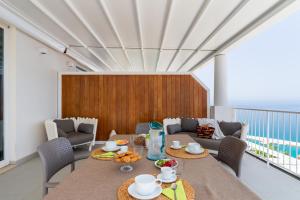 Posedenie v ubytovaní Villas d'Orlando - with private pool and sea view