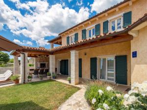 Vonkajšia záhrada v ubytovaní Holiday Home Baretuni by Interhome
