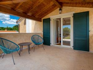 Balkón alebo terasa v ubytovaní Holiday Home Baretuni by Interhome