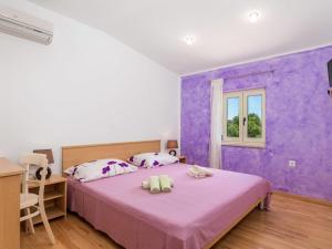 Posteľ alebo postele v izbe v ubytovaní Holiday Home Baretuni by Interhome