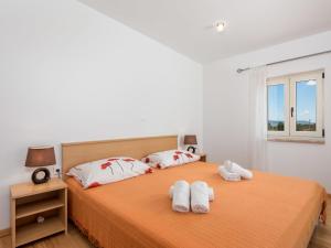 Posteľ alebo postele v izbe v ubytovaní Holiday Home Baretuni by Interhome