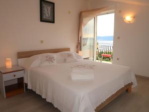 Postel nebo postele na pokoji v ubytování Apartment Marinella-1 by Interhome