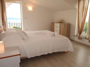 Postel nebo postele na pokoji v ubytování Apartment Marinella-1 by Interhome