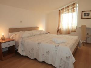 Postel nebo postele na pokoji v ubytování Apartment Marinella-1 by Interhome