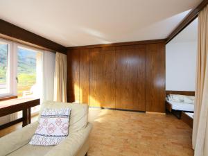 a living room with a couch and a sink at Apartment Ringstrasse Apt 212 by Interhome in Leukerbad