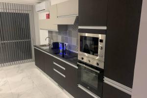 Kuchyň nebo kuchyňský kout v ubytování Willeg Retreats 7A 1 Bedroom Luxury Flat Qala Gozo
