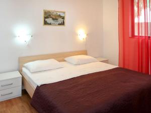 Posteľ alebo postele v izbe v ubytovaní Apartment Jure by Interhome