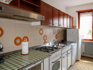 A kitchen or kitchenette at Apartment Pancheri by Interhome