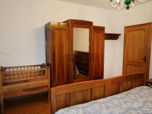 A bed or beds in a room at Apartment Pancheri by Interhome