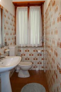 A bathroom at Apartment Pancheri by Interhome