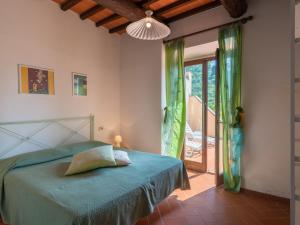 Ein Bett oder Betten in einem Zimmer der Unterkunft Holiday Home Vigna La Corte-1 by Interhome