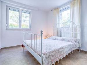 Posteľ alebo postele v izbe v ubytovaní Apartment File-6 by Interhome