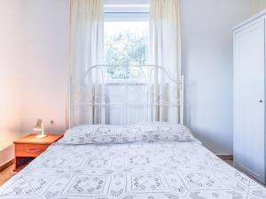 Posteľ alebo postele v izbe v ubytovaní Apartment File-6 by Interhome