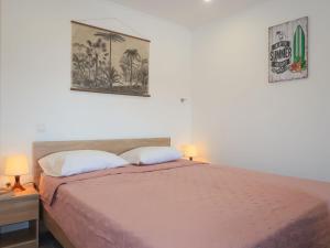 Postel nebo postele na pokoji v ubytování Apartment Gordana-1 by Interhome
