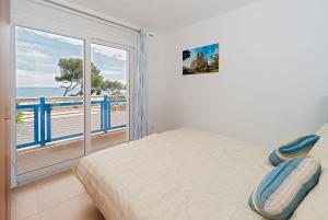 Postel nebo postele na pokoji v ubytování Apartamentos Mar y Sol