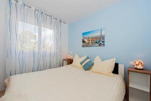Postel nebo postele na pokoji v ubytování Apartamentos Mar y Sol