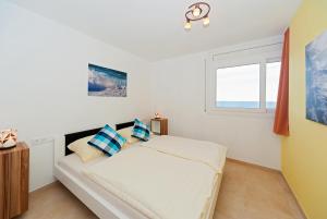 Postel nebo postele na pokoji v ubytování Apartamentos Mar y Sol