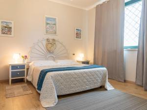 Postel nebo postele na pokoji v ubytování Holiday Home Borgo Sacramento by Interhome