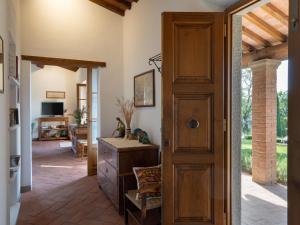 a hallway with a door leading to a living room at Holiday Home Casa 360 by Interhome in Greve in Chianti