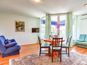 a dining room with a table and chairs at Apartment File-4 by Interhome in Zambratija