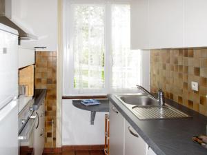 Η κουζίνα ή μικρή κουζίνα στο Holiday Home Les Embruns by Interhome +19 φωτογραφίες