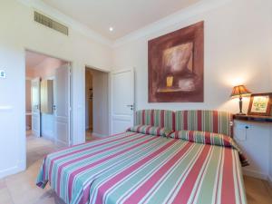 A bed or beds in a room at Villa Son Maguet by Interhome