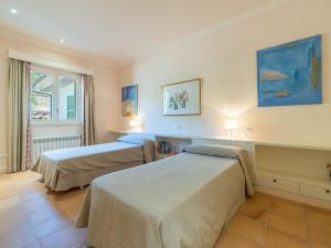 A bed or beds in a room at Villa Son Maguet by Interhome