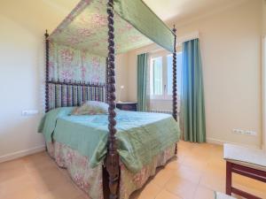 A bed or beds in a room at Villa Son Maguet by Interhome