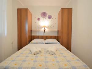 Posteľ alebo postele v izbe v ubytovaní Holiday Home Gloria by Interhome