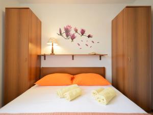 Posteľ alebo postele v izbe v ubytovaní Holiday Home Gloria by Interhome